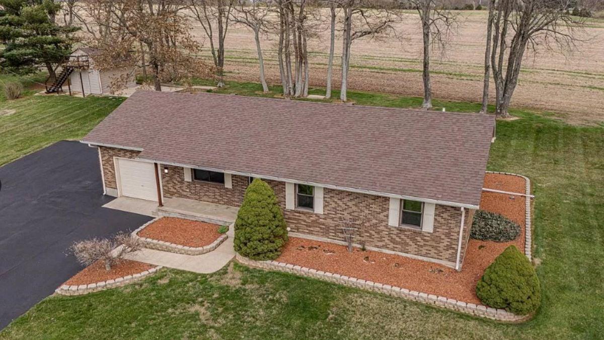 Aerial View Highlights the Neat Brickwork and Well-Maintained Landscape