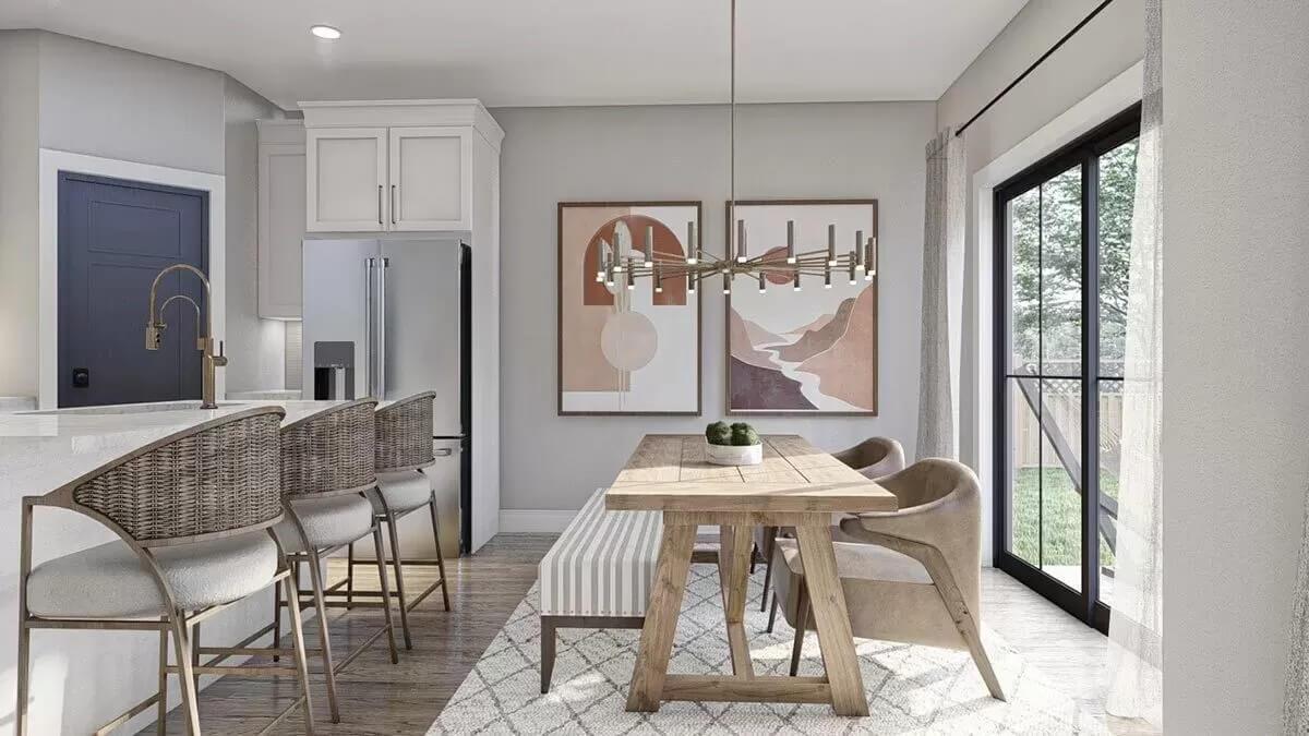 Notice the Bold Artwork in This Chic Dining Area