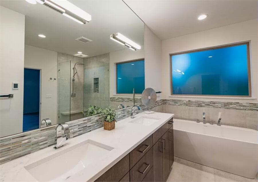 Check Out the Dual Sinks and Subtle Tile Accents in This Sleek Bathroom
