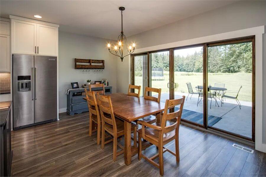 Charming Dining Area with a View and Rustic Table