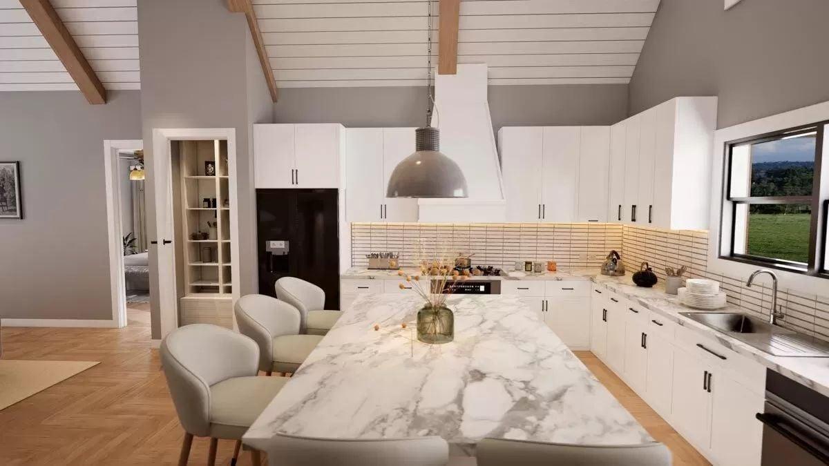 Wow, Check Out the Marble Island and Vaulted Ceilings in This Kitchen