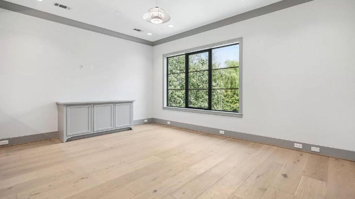 Notice the Expansive Windows Bringing Nature Indoors in This Minimal Room