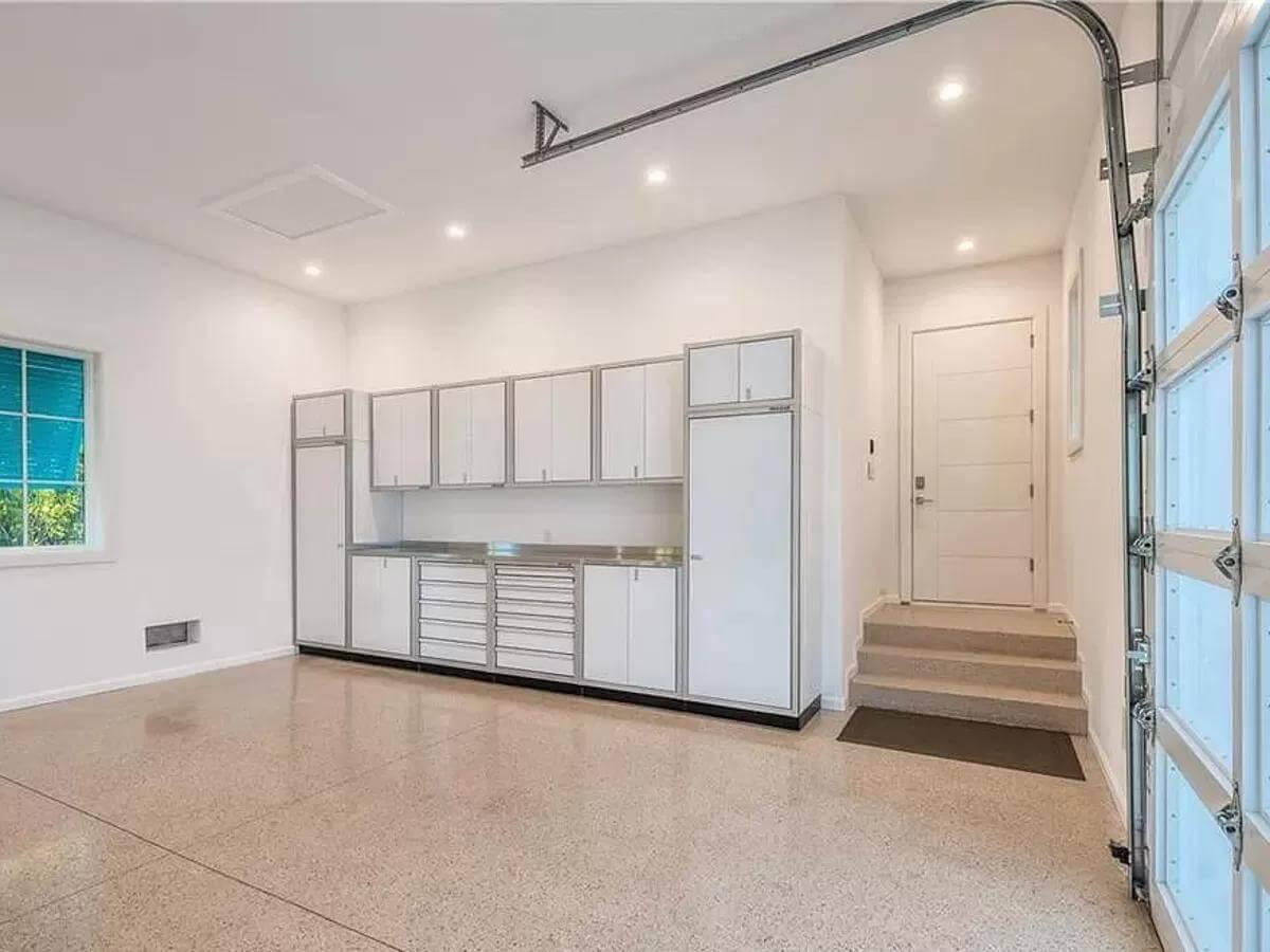 Spotless Garage with Built-In Storage and Polished Floors