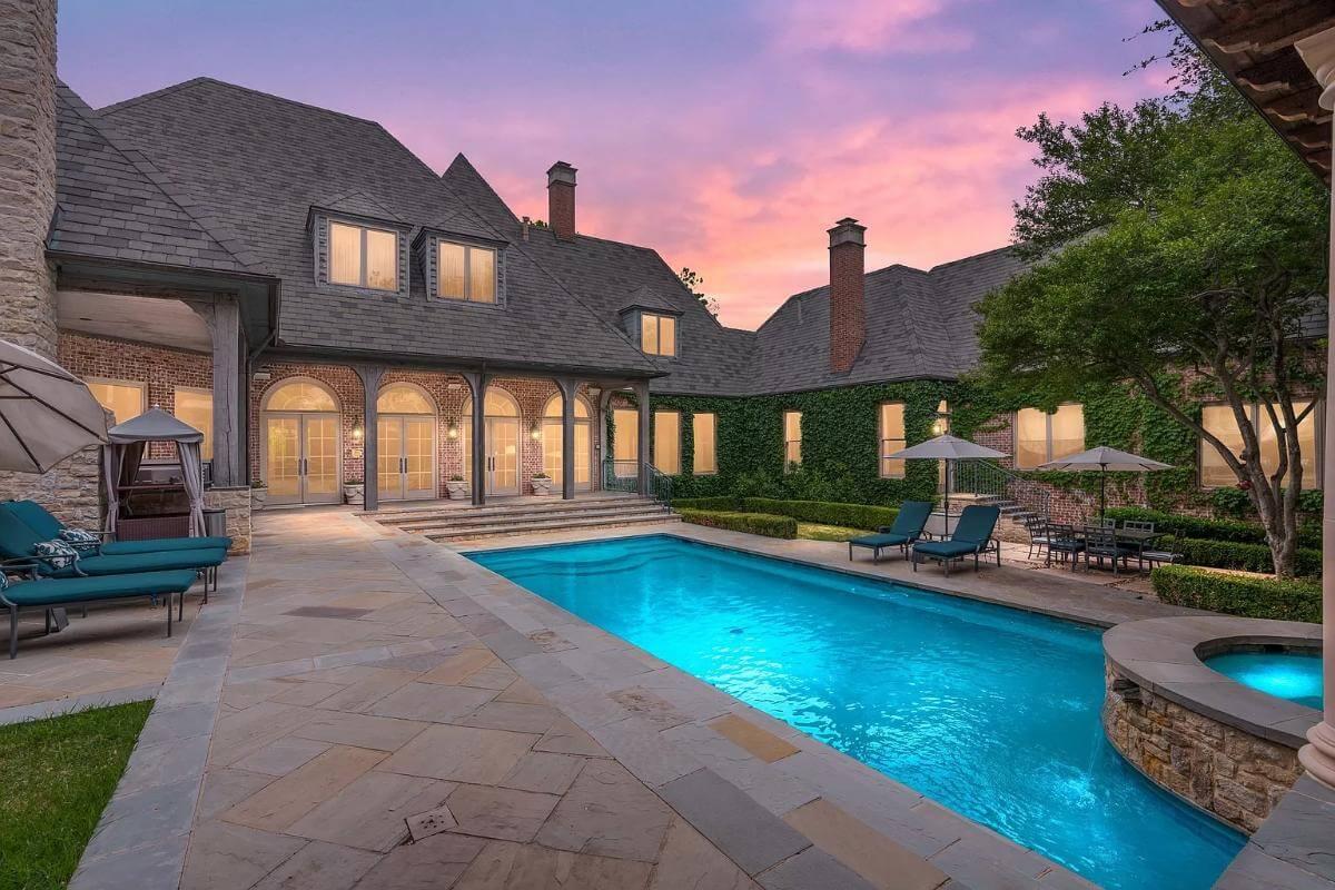 Stunning Poolside Bliss with Stone Detailing and Ivy-Clad Walls
