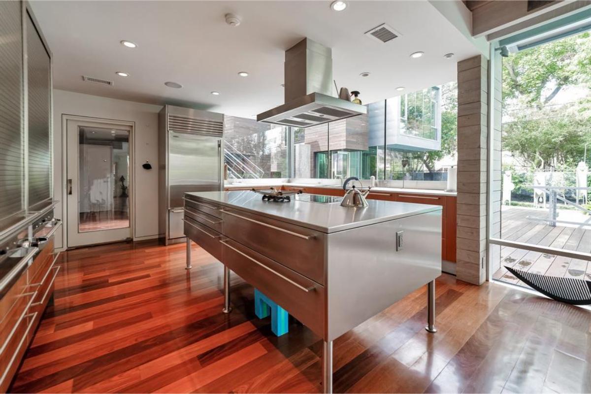 Stainless Steel Island Takes Center Stage in This Modern Kitchen