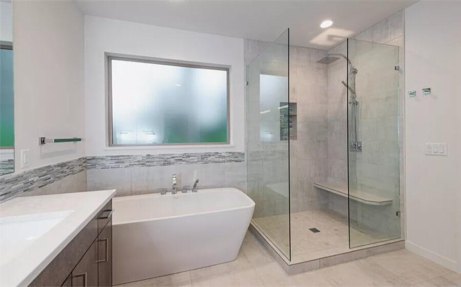 Wow, Check Out the Freestanding Tub and Spacious Glass Shower in This Modern Bath