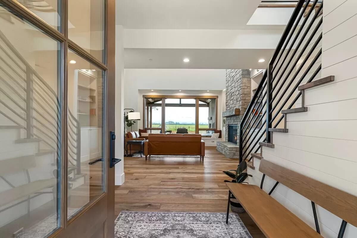 Step Inside and Notice the Stone Fireplace Anchoring This Living Area