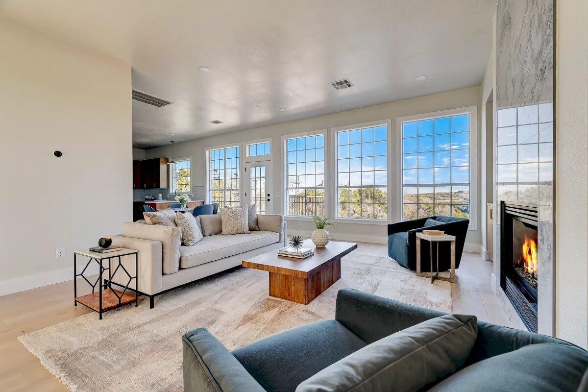 Wow, Floor-to-Ceiling Windows in This Living Room Feel Like an Art Gallery