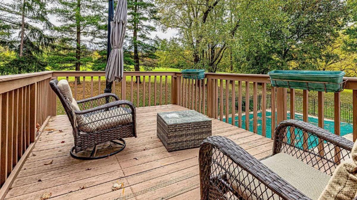 Relaxing on the Deck Surrounded by Lush Greenery