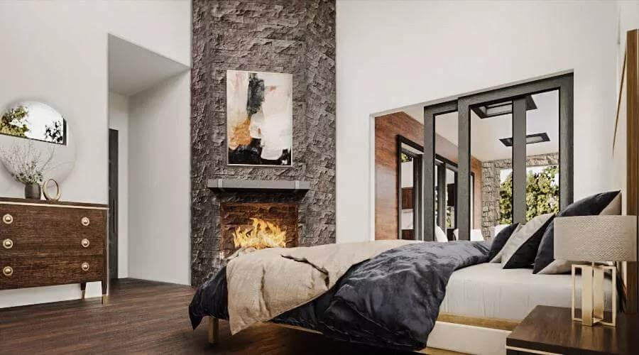 Modern Bedroom Featuring a Striking Stone Fireplace