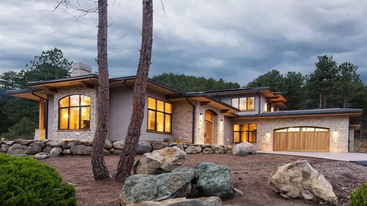 Loving the Stone Facade and Expansive Windows of This Modern Home