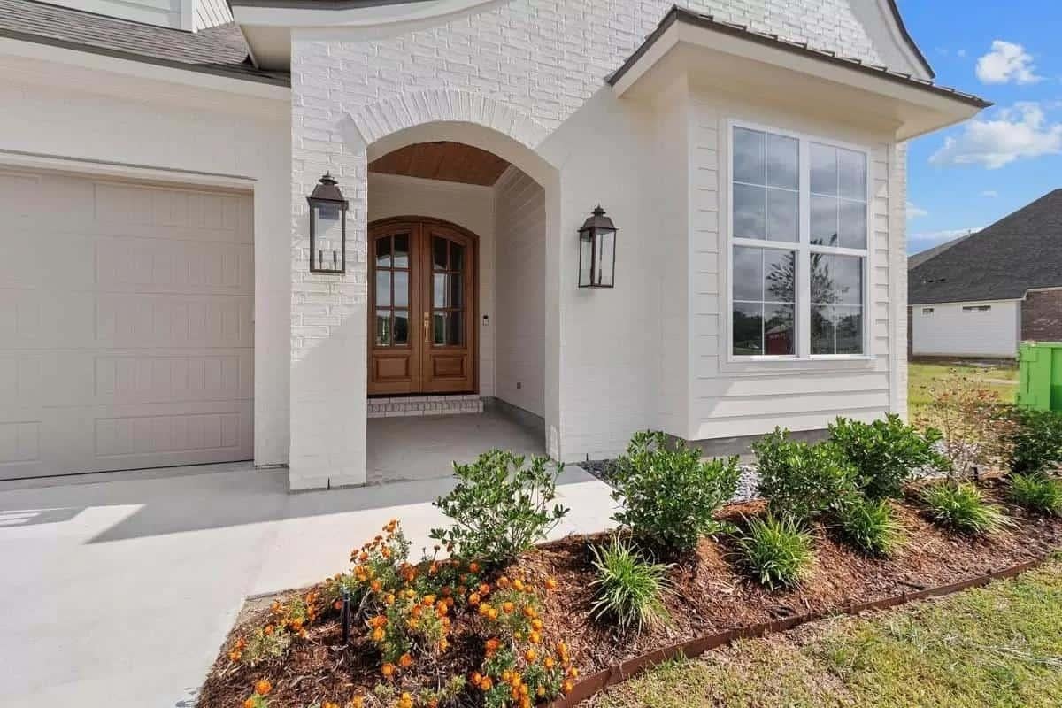 Admire the Classic Lanterns Framing This Arched Entrance