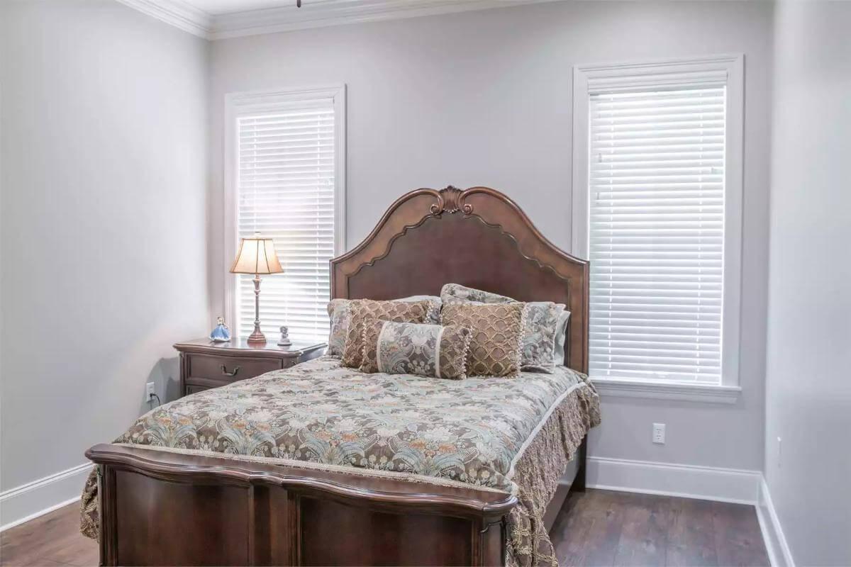 Spot the Traditional Wooden Bed Frame in This Cozy Craftsman Bedroom