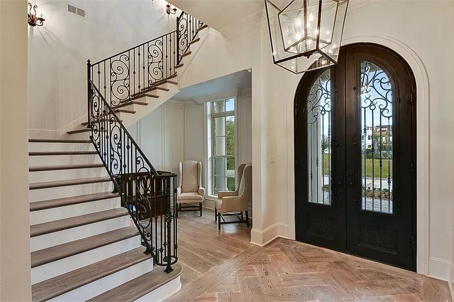 Wow, Look at That Intricate Ironwork on the Staircase