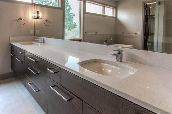 Notice the Double Vanity with Sleek Hardware in This Modern Bathroom