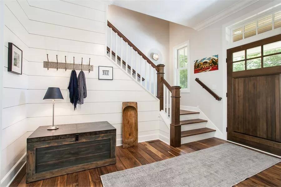 Notice the Rich Wooden Accents in This Craftsman Entryway