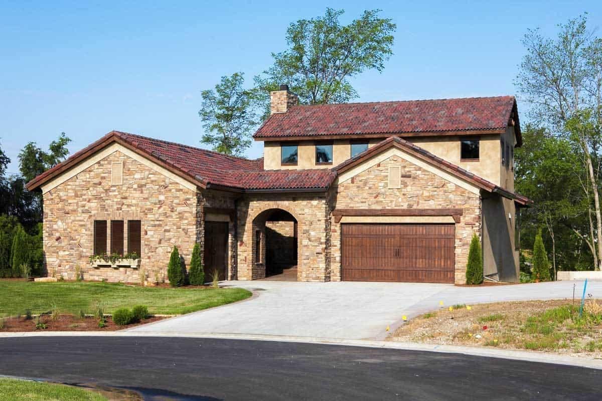 Check Out the Rustic Stone Façade on This Mediterranean-Inspired Home