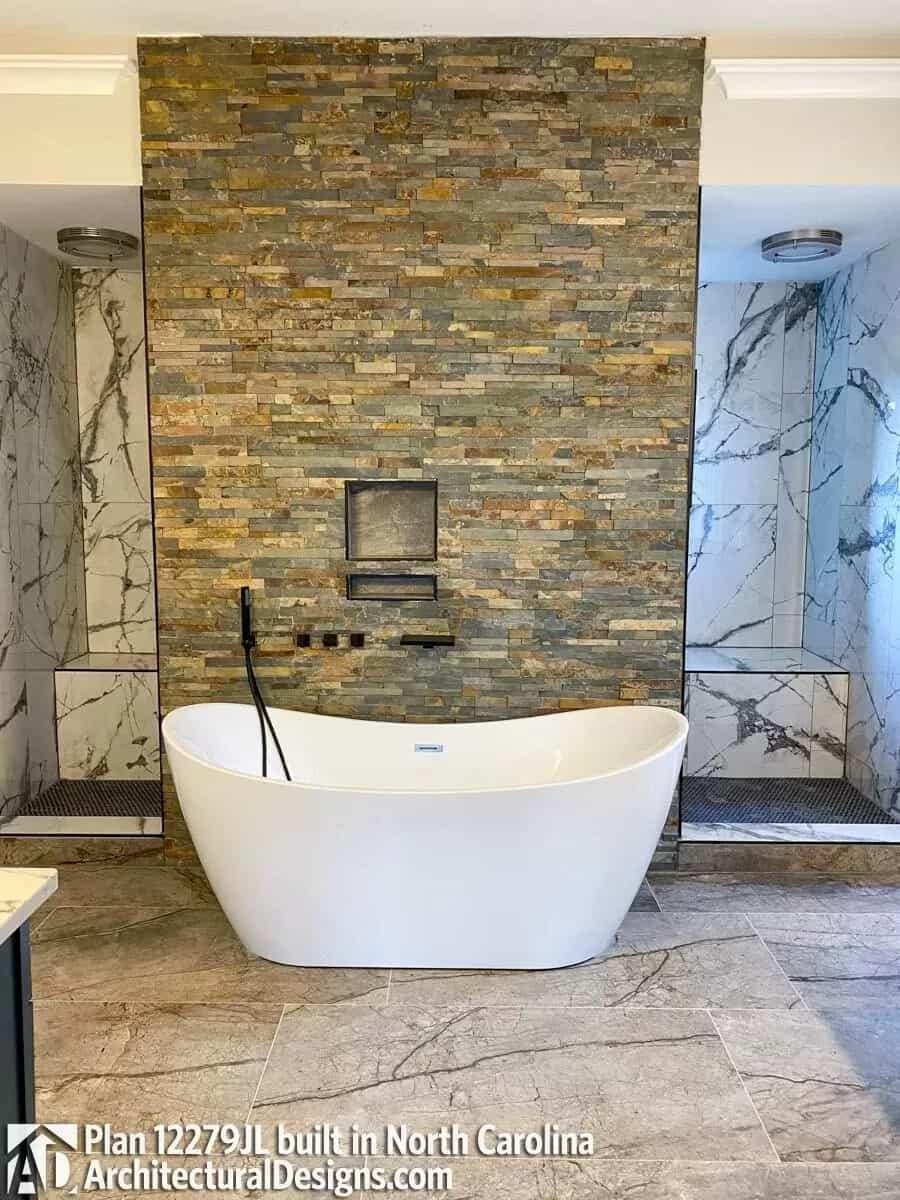Look at This Freestanding Tub Paired with a Textured Stone Wall