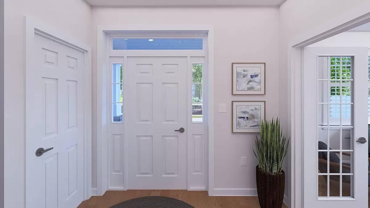 Notice the Crisp White Entryway with Glass Panel Doors