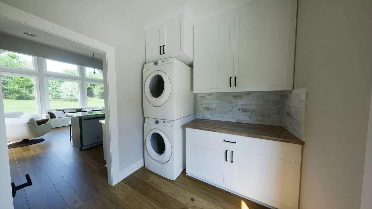 I Love the Functional Stackable Washer and Dryer in This Compact Laundry Space