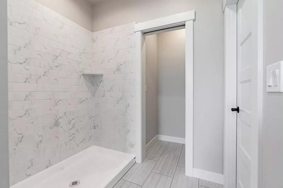 Sleek Walk-In Shower with Marble-Look Tile