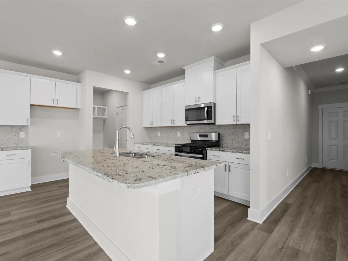 Craftsman-Style 4-Bedroom Home with Covered Patio and Two-Car Garage (2,345 Sq. Ft. Floor Plan)