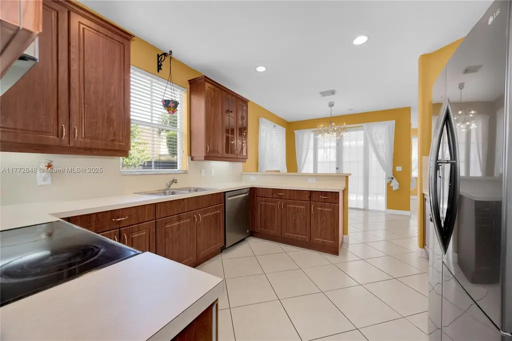Mediterranean 4-Bedroom Revival-Style Home with Covered Patio and Two-Car Garage (2,747 Sq. Ft. Floor Plan)
