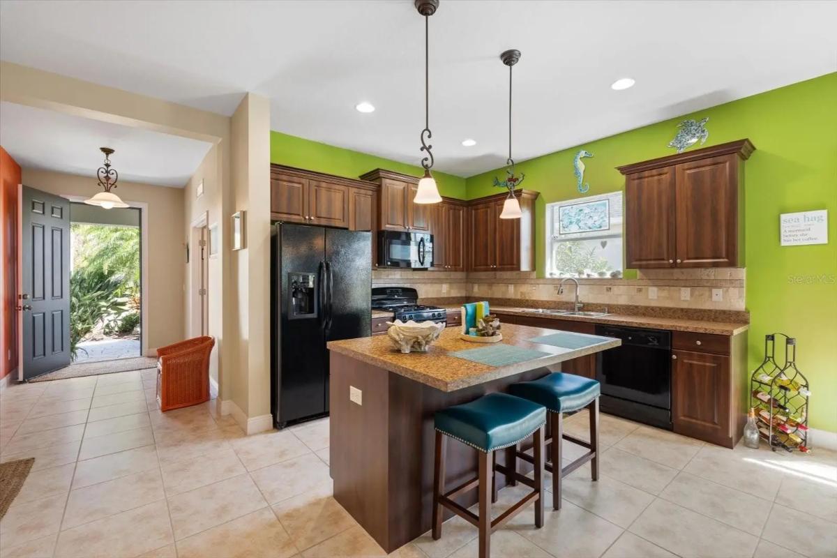 Contemporary 3-Bedroom Florida Home with Front Porch and Screened-in Pool (1,805 Sq. Ft. Floor Plan)