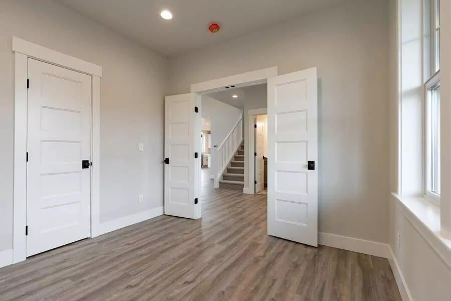 Take a Look at the Classic Craftsman Doors in This Versatile Room