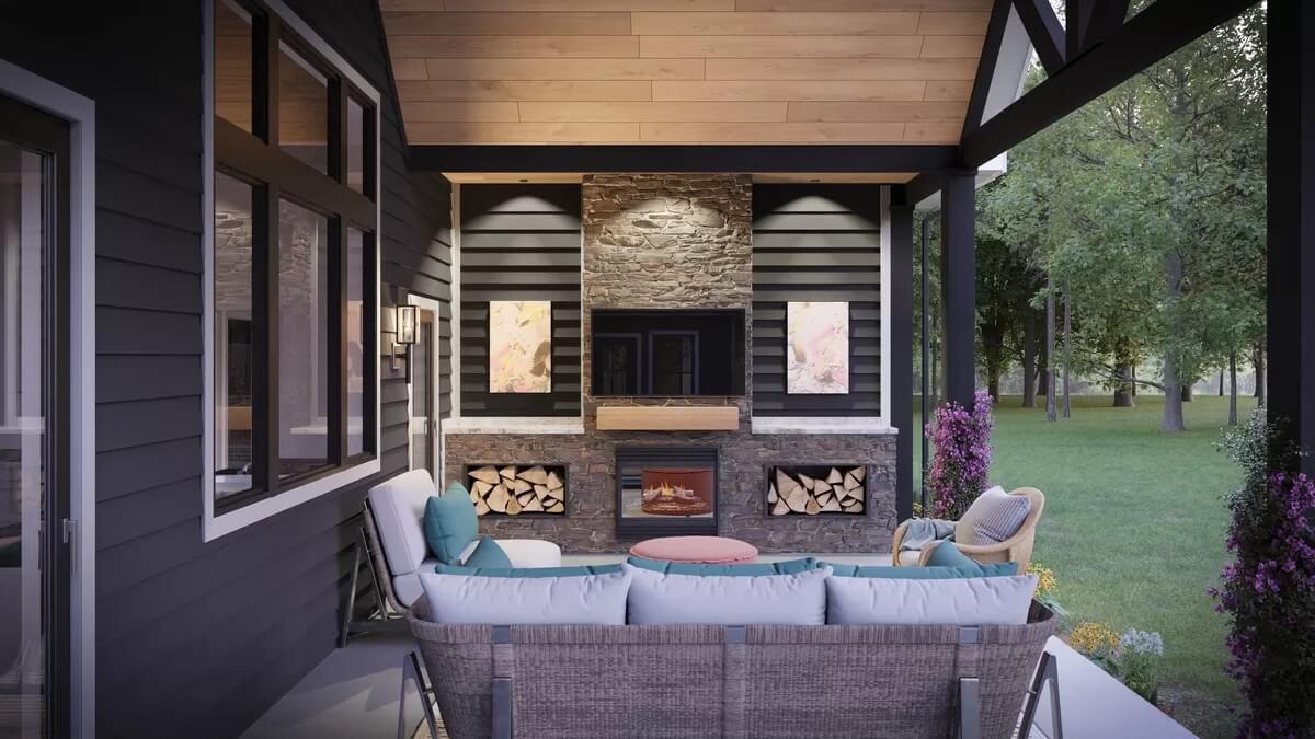 Outdoor Living Space With a Stone Fireplace That Draws You In