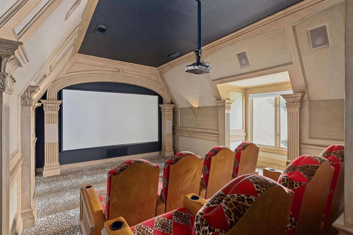 Step Into This Luxurious Home Theater With Its Intricate Ceiling Design