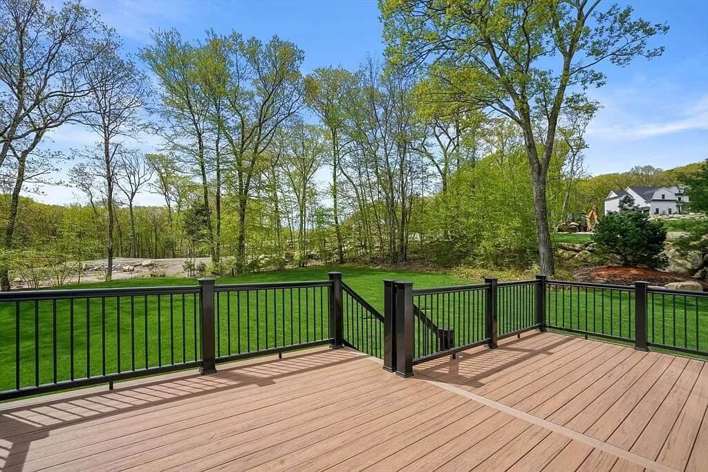Step Out on This Spacious Deck Overlooking Verdant Grounds