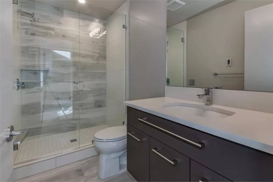You Have to See This Sleek Shower with Textured Tile