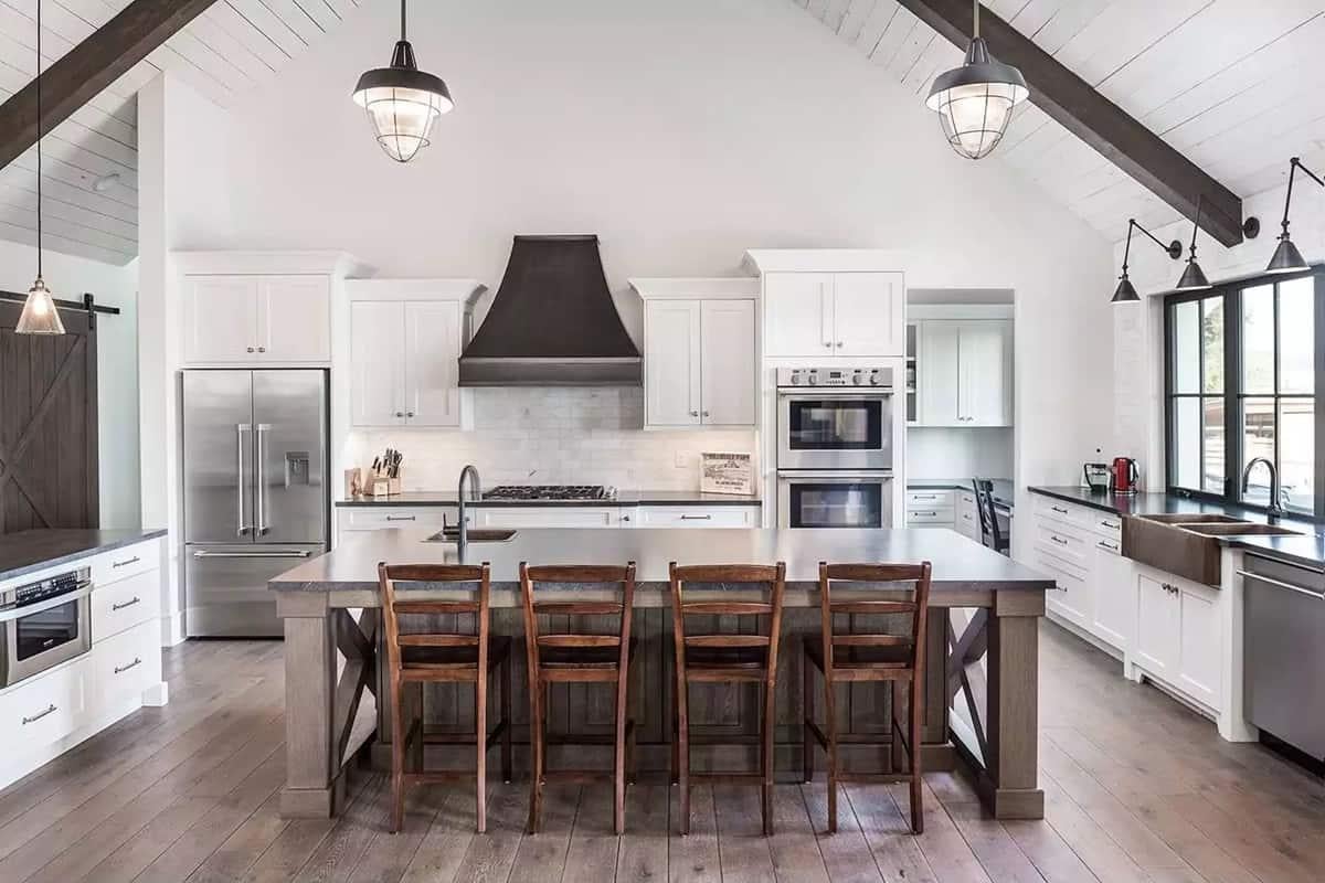 Notice the Striking Dark Range Hood in This Farmhouse Kitchen