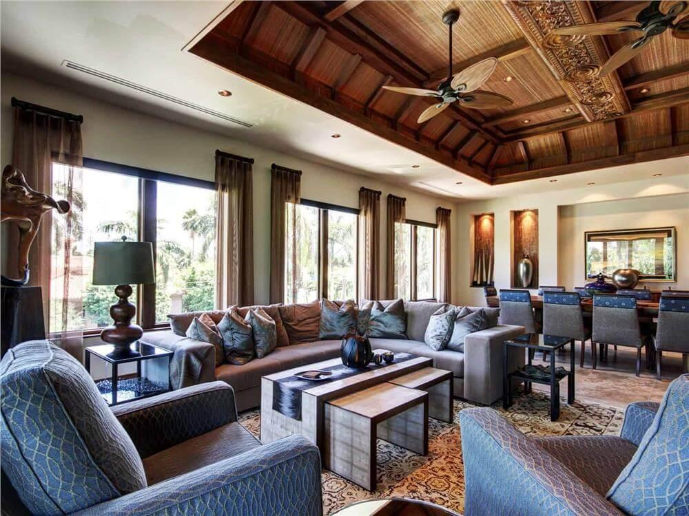 Wow, Look at the Intricate Wooden Ceiling Detail in This Cozy Gathering Room