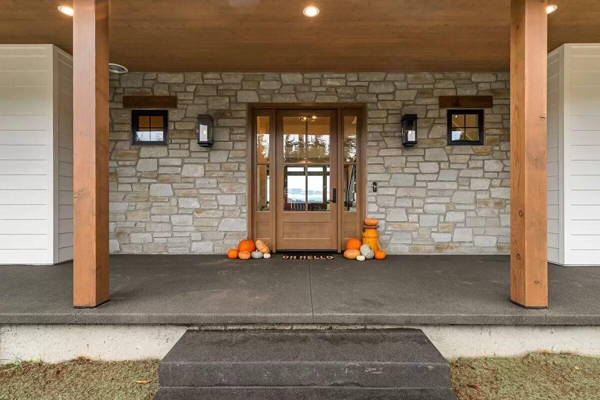 Take a Peek at This Inviting Porch with Rustic Stonework