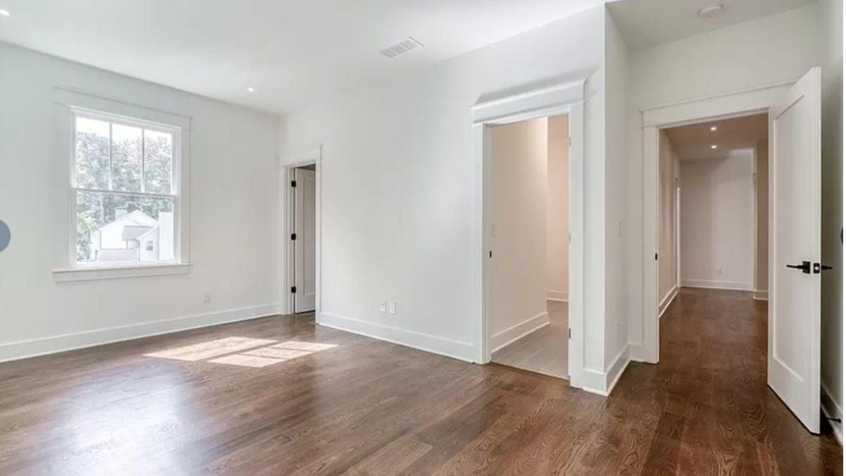 Notice the Elegant Trim in This Sunlit Craftsman Bedroom