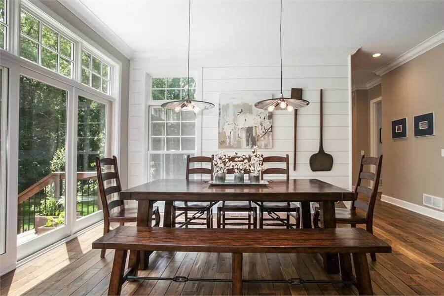 Dining Room with Rustic Wood Table and Bright Natural Light
