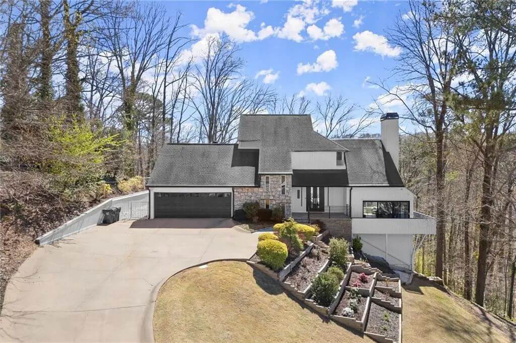 Contemporary-Style 4-Bedroom Home for a Sloped Lot with Covered Front Porch (4,547 Sq. Ft. Floor Plan)