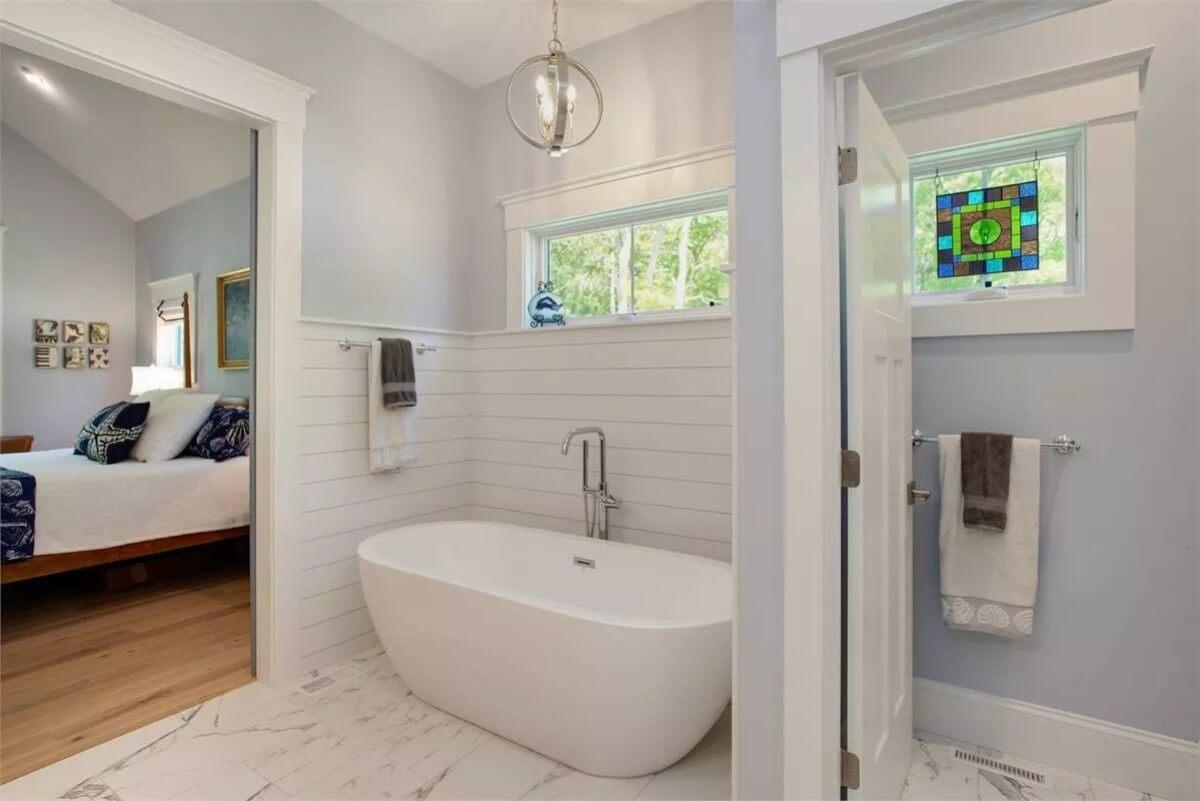 Wow, Look at This Freestanding Tub and Stained Glass Window Combo