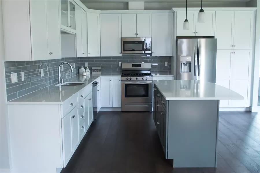 Notice the Sleek Two-Toned Cabinets in This Craftsman Kitchen
