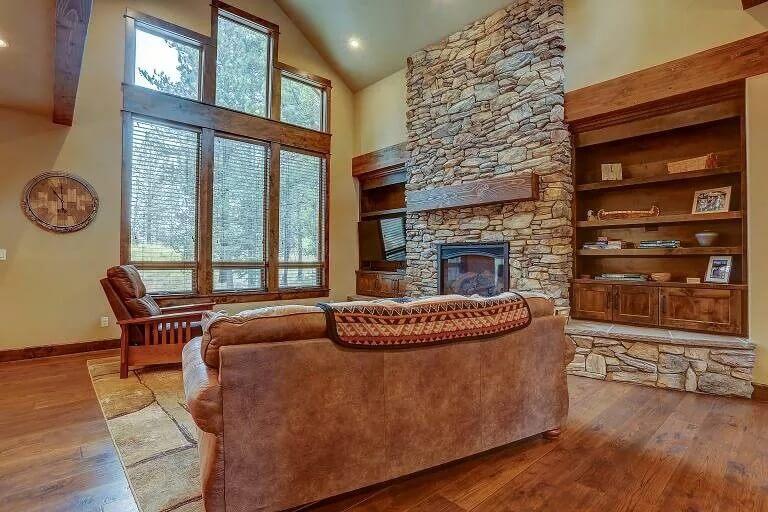 Rustic Great Room with a Floor-to-Ceiling Stone Fireplace