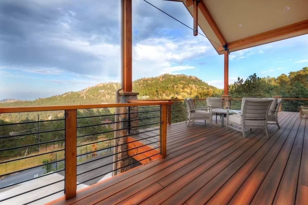Soak in Nature from This Expansive Deck with Modern Railings