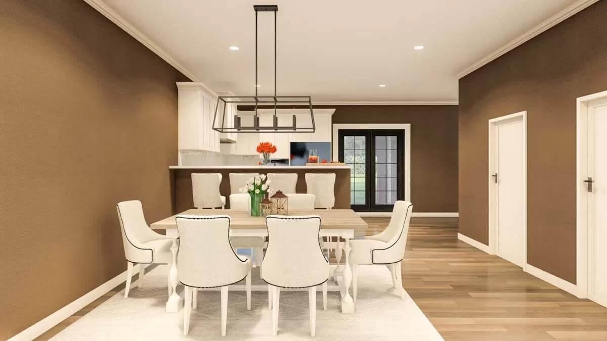 Elegant Dining Room with Crisp White Trim Against Rich Brown Walls