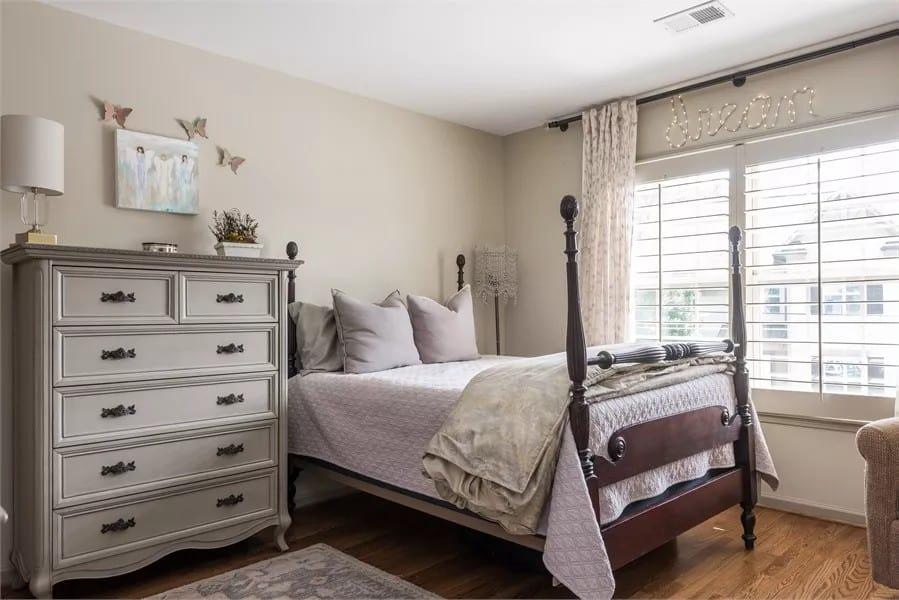 Classic Bedroom With a Touch of Whimsy in Its Wall Decor