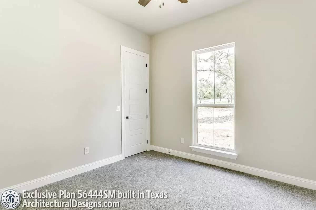 Notice the Sleek Ceiling Fan Adding Functionality to This Bright Room