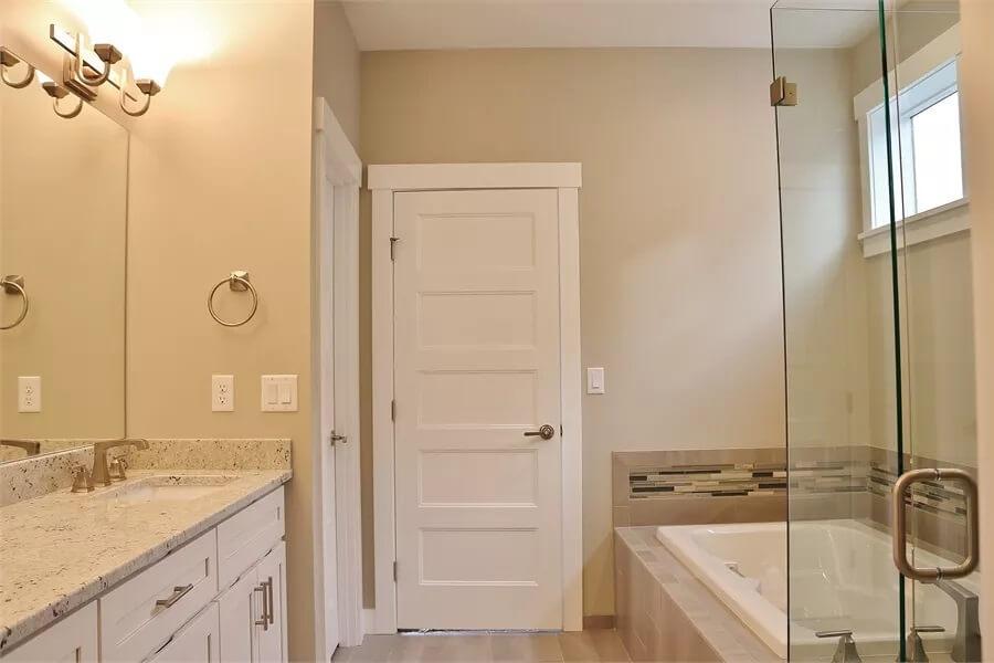 Modern Craftsman Bathroom with Granite Vanity and Recessed Tub