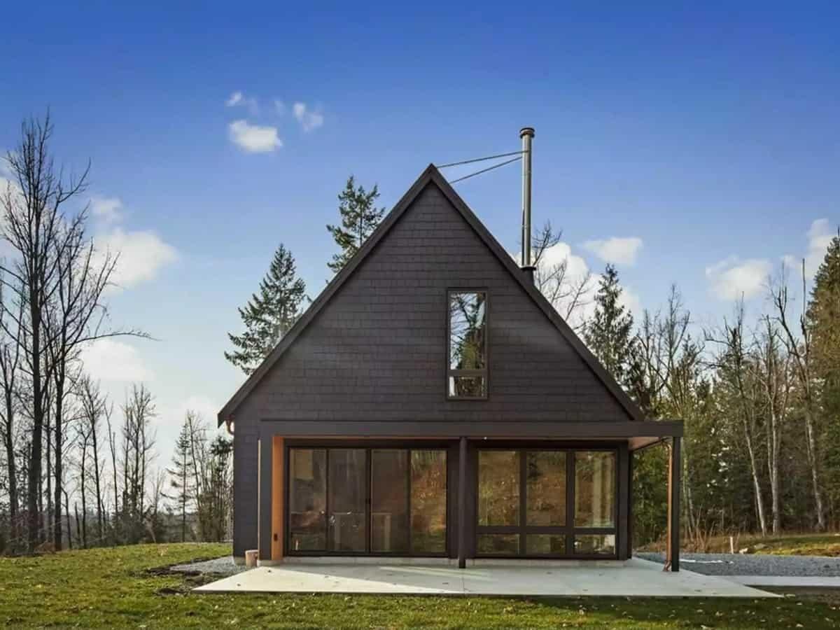 Appreciate the Sleek Simplicity of This A-Frame Cabin with a Wall of Windows
