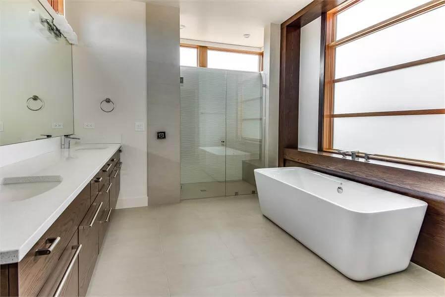 Wow, Take a Look at This Freestanding Tub with Frosted Glass Panels