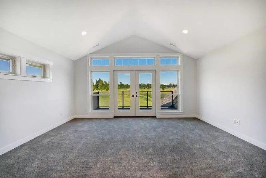 Expansive Windows in This Light-Filled Bonus Room Elevate the Space